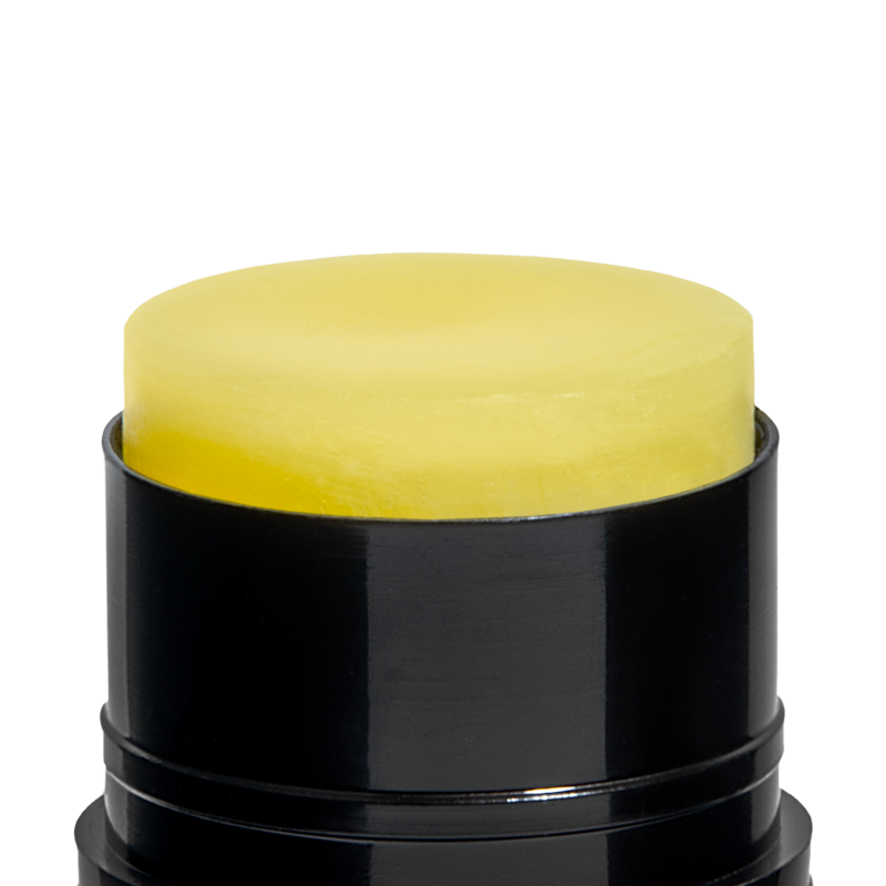 Battle Balm Stick Open See the Pure Gold Color of All Natural Organic Topical Pain Cream For Athletes & High Performance Humans